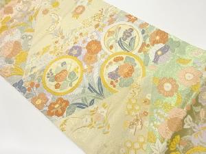 丸文に花々・蝶模様織出し袋帯